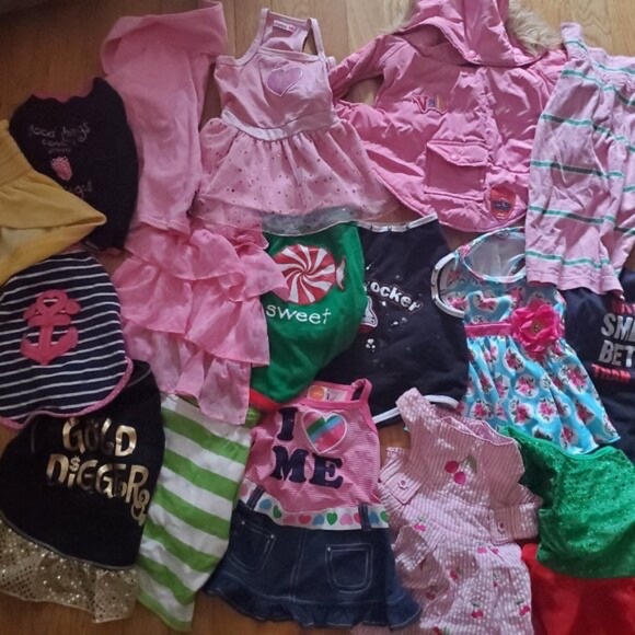 Various dog dresses size medium